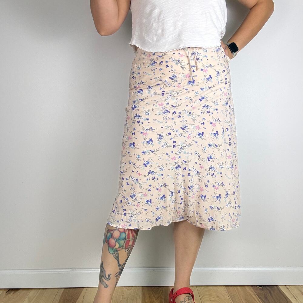 Cotton candy LA pale pink skirt with blue flowers size small.